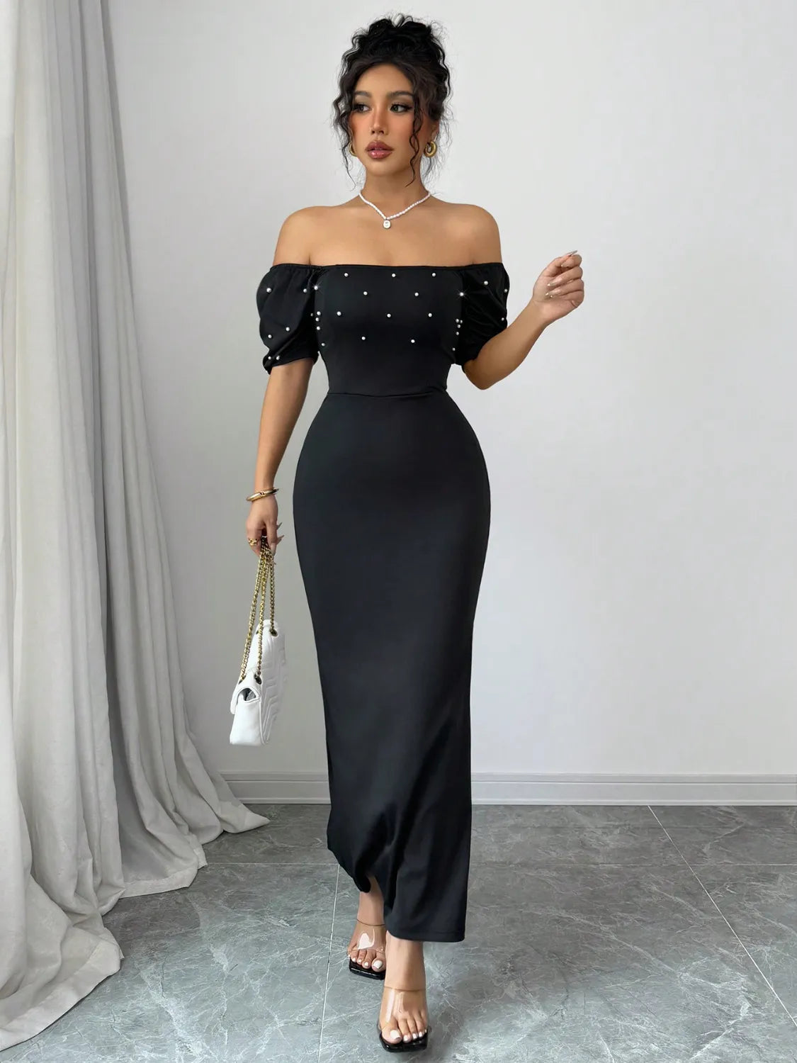 Model wearing Off Shoulder Short Sleeve Maxi Dress