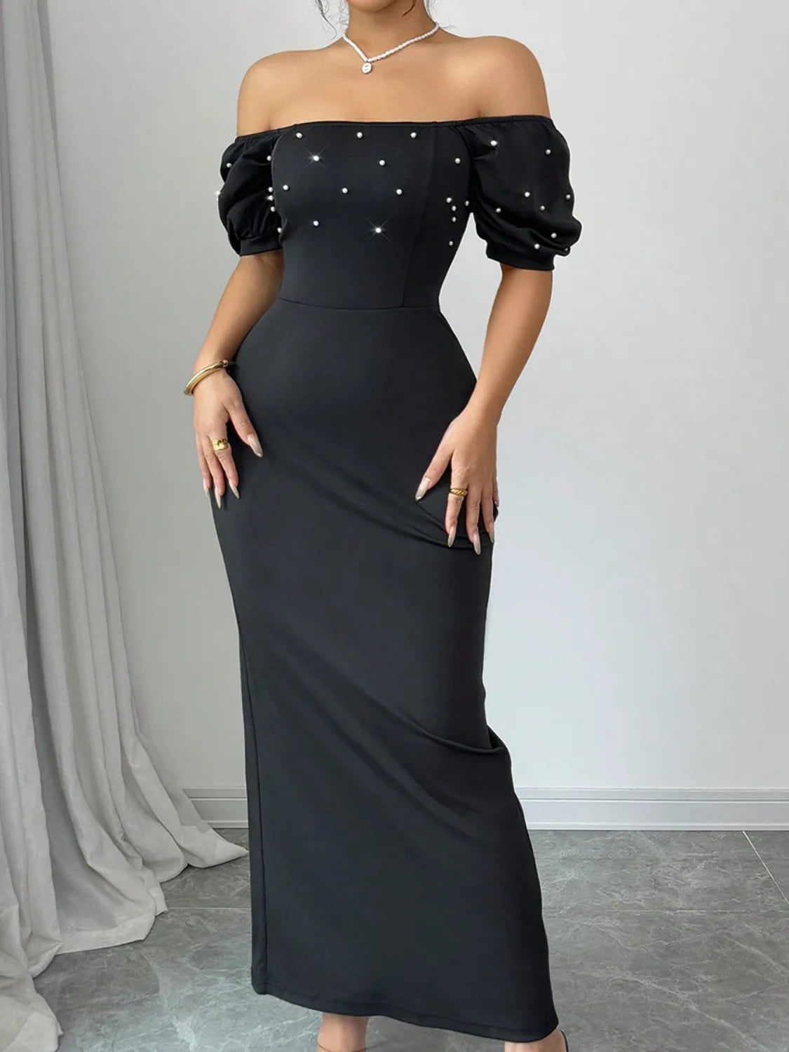 Model wearing Off Shoulder Short Sleeve Maxi Dress