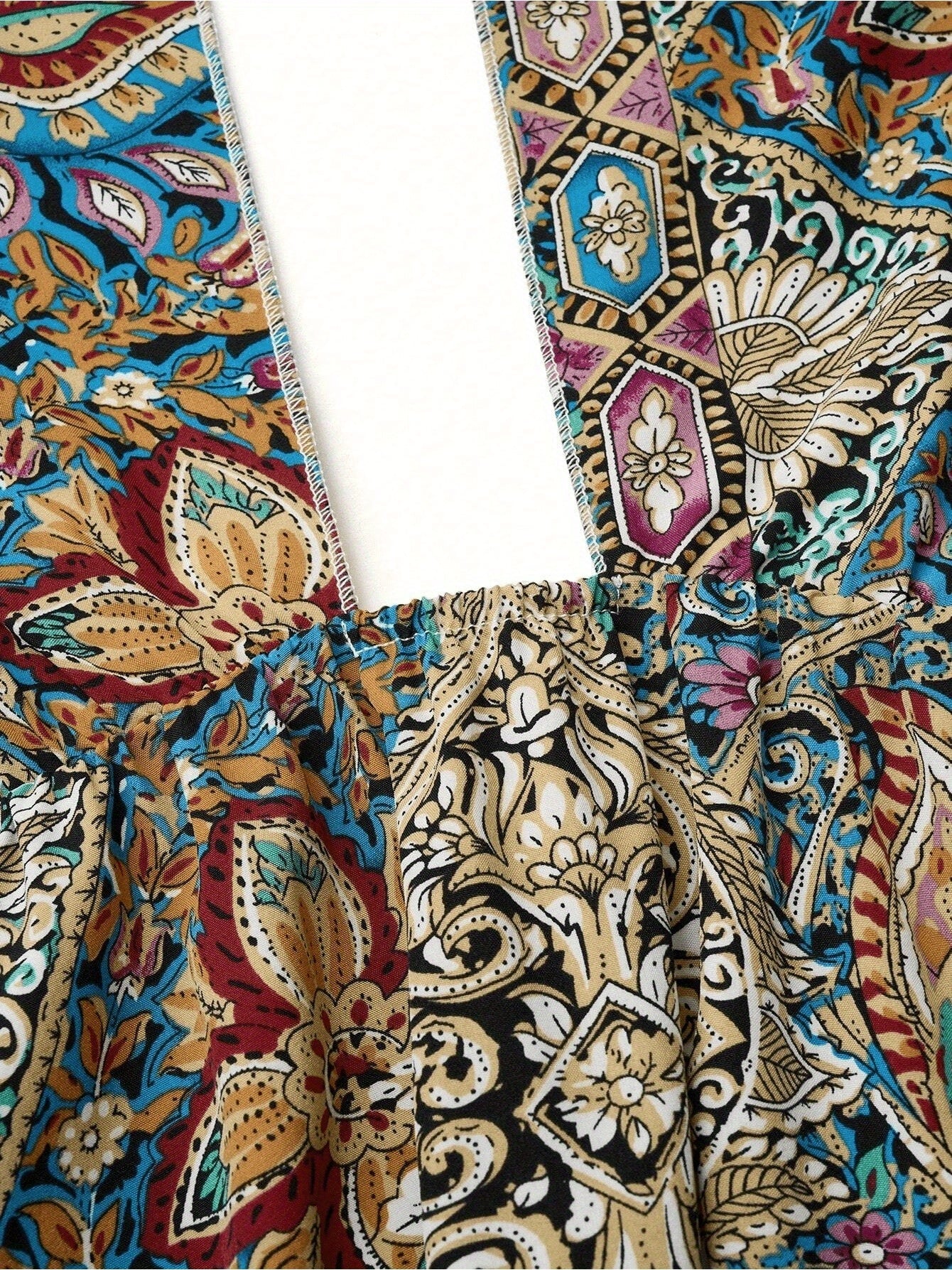 close up of material print of Tropical Print High Waisted Cross Halter Neck Maxi Dress